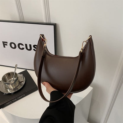 Crescent Textured Shoulder Bag