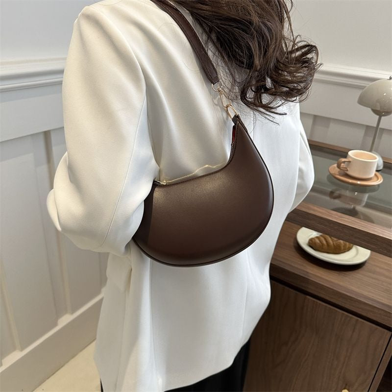 Crescent Textured Shoulder Bag
