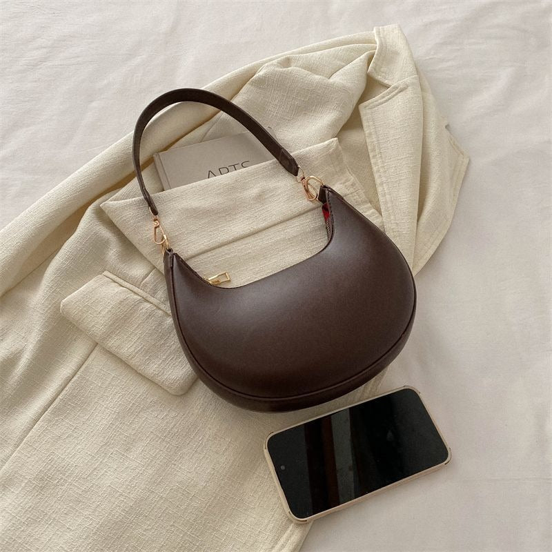 Crescent Textured Shoulder Bag