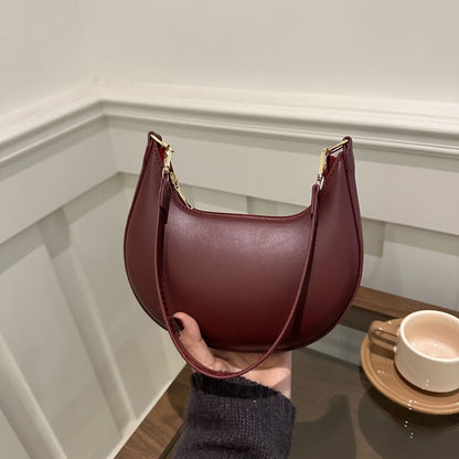Crescent Textured Shoulder Bag